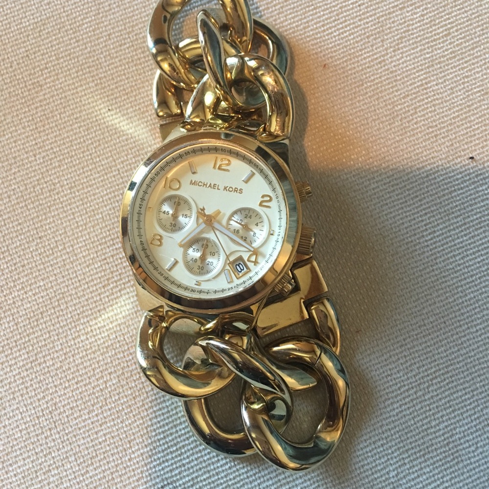 Michael Kors women’s link bracelet watch.